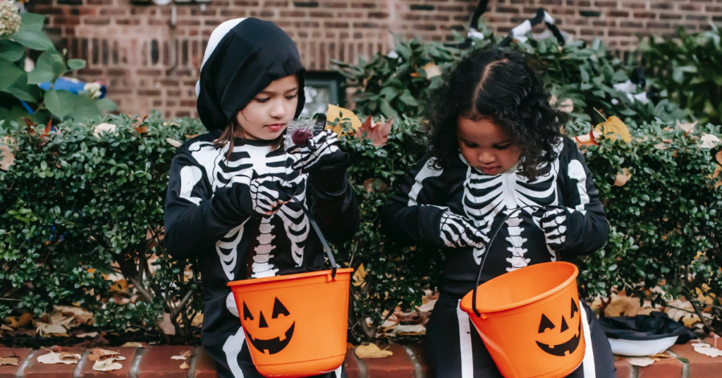 kids trick-or-treating for braces-friendly candy on halloween